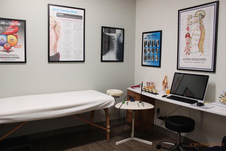 education-and-exam-room-chiropractor-chiropractic-office-design