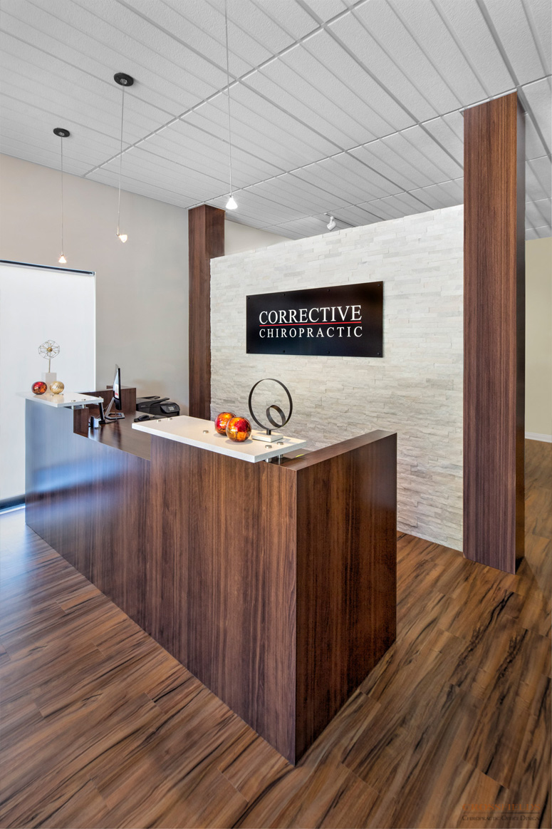 Front-Desk-with-Logo-small-chiropractic-clinic-remodeling